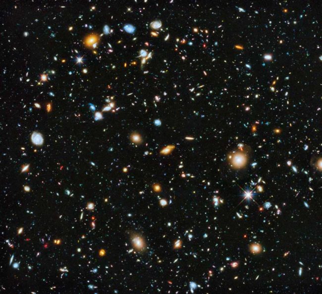 Composite image showing the visible and near infrared light spectrum This is a composite image showing the visible and near infrared light spectrum collected from Hubble's ACS and WFC3 instruments over a nine-year period. Astronomers using NASA's Hubble Space Telescope have assembled a comprehensive picture of the evolving universe – among the most colorful deep space images ever captured by the 24-year-old telescope. Researchers say the image, in new study called the Ultraviolet Coverage of the Hubble Ultra Deep Field, provides the missing link in star formation. The Hubble Ultra Deep Field 2014 image is a composite of separate exposures taken in 2003 to 2012 with Hubble's Advanced Camera for Surveys and Wide Field Camera 3.